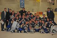 Hamilton men's ice hockey celebrates its 2011 Skidmore Invitational title.